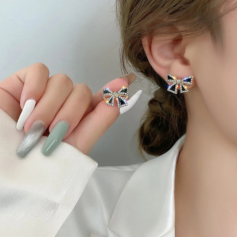 Trendy Rhinestone Bowknot Stud Earrings - Unique Design
