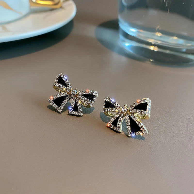 Trendy Rhinestone Bowknot Stud Earrings - Unique Design